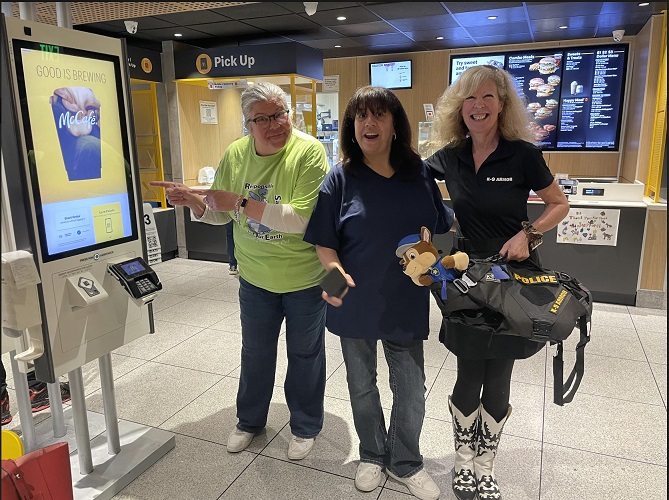 Karla Peterson and Lori Diaz, teachers at Mattie Lou Maxwell Elementary and Suzanne Saunders, cofounder K-9 Armor at McDonalds in Anaheim for McTeachers Day