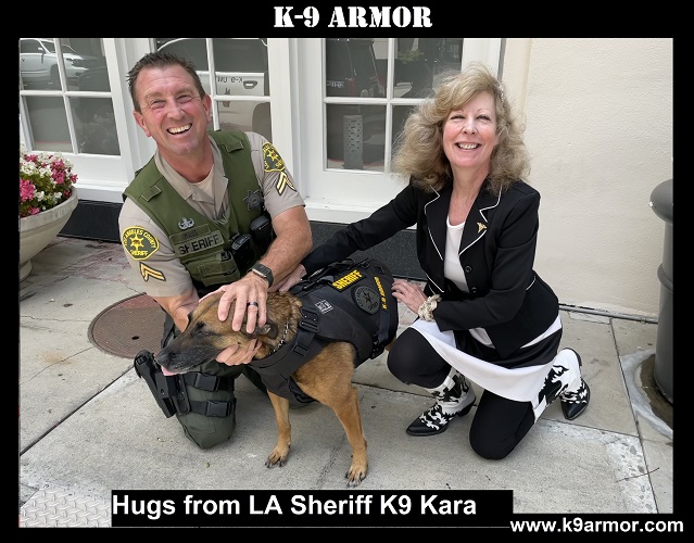 Hugs from LA Sheriff Deputy Maus and K9 Kara with K9 Armor cofounder Suzanne