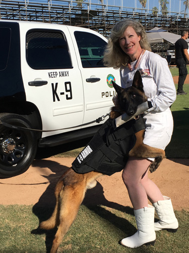 Placentia PD K9 Ace gave hugs to K9 Armor cofounder Suzanne Saunders at the 2016 OCPCA K9 Benefit Show. Photos by Placentia K9 Assoc. Christina Marbrey