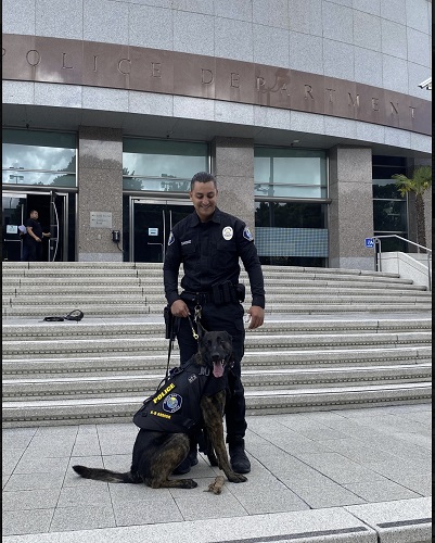Smiles from Officer Sanchez and K9 Jack