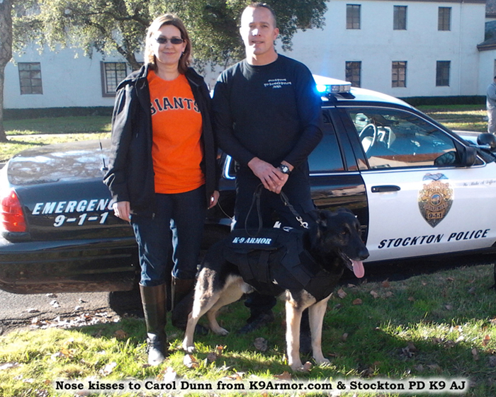 Nose kisses to sponsor Carol Dunn from K9Armor.com and Stockton PD K9 AJ